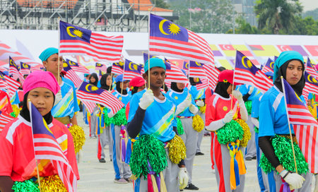 KUALA LUMPUR, MALAYSIA - AUGUST 29, 2016 : Performers waving Malaysia flag also known as Jalur...