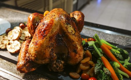 Roasted Turkey at kitchen for Thanksgiving and Christmas dinner.の写真素材