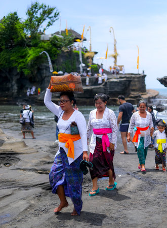 BALI, INDONESIA - NOVEMBER 15, 2017 : Balinese women in traditional clothes during religious ceremony at Tanah Lot temple, Bali.のeditorial素材