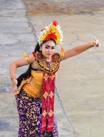 BALI, INDONESIA - NOVEMBER 15, 2017 : Women performing traditional Bali dance at Garuda Wisnu Kencana Cultural Park or GWK, a cultural park located at Ungasan Bali.のeditorial素材