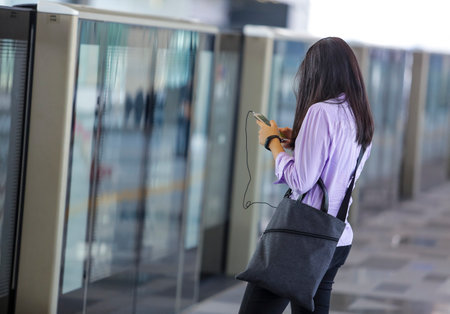 KUALA LUMPUR, MALAYSIA - JULY 22, 2017 : Passenger waiting for Malaysia MRT (Mass Rapid Transit) train at Taman Midah Station. MRT is a new transportation for future generation in Malaysia.のeditorial素材