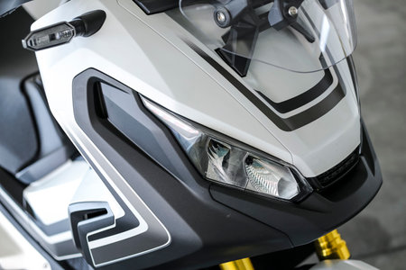 KUALA LUMPUR, MALAYSIA - NOVEMBER 15, 2018 : Front light. Detail and close up of Honda X-ADV 745cc...