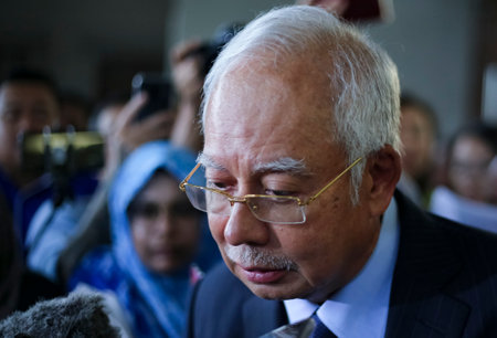 KUALA LUMPUR, MALAYSIA - SEPTEMBER 20, 2018 : Former Malaysia's prime minister, Najib Razak (C) reacts as he speaks to journalists after a court appearance in Kuala Lumpur Courts Complex.のeditorial素材