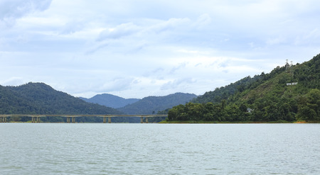 The East-West Highway, is the main gateway between east and west coast of peninsula Malaysia, passes through the Royal Belum State Park and the man-made Lake Temengor Pulau Banding in Perak.の写真素材