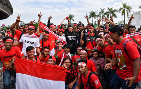 SELANGOR, MALAYSIA - AUGUST 26, 2017 :  Indonesia football fans during men's football Group B round match of the 29th Southeast Asian Games (SEA Games) between Indonesia against Malaysia at Shah Alam Stadium.のeditorial素材
