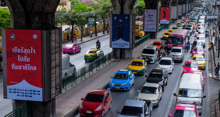 BANGKOK, THAILAND - APRIL 07, 2017 : Traffic moves slowly along a busy road in Bangkok city center, Thailand.のeditorial素材