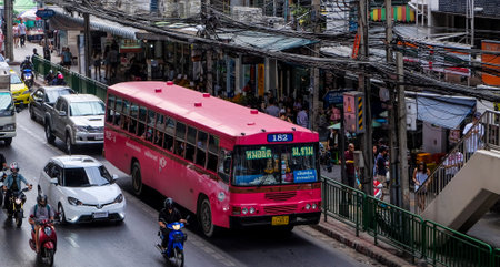 BANGKOK, THAILAND - APRIL 07, 2017 : A famous pink bus in Bangkok city center, Thailand.