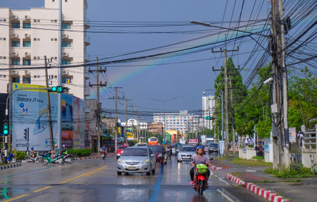 HATYAI, THAILAND - APRIL 06, 2017 : Traffic moves along a busy road in Hatyai city center, Thailand.のeditorial素材