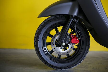 Modern classic style scooter motorcycle for young people and trendy lifestyle.の写真素材