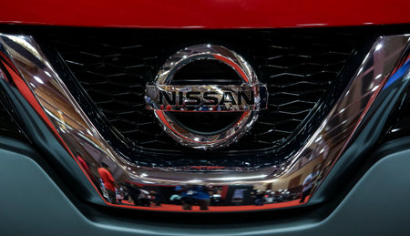 KUALA LUMPUR, MALAYSIA - APRIL 26, 2018 : Logo of Nissan Motor Co., Ltd., usually shortened to Nissan, is a Japanese multinational automobile manufacturer headquartered in Nishi-ku, Yokohama.のeditorial素材