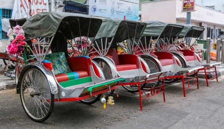 PENANG, MALAYSIA - JULY 05, 2019 : Old vintage trishaw also known as tricycle rickshaw or beca ready...