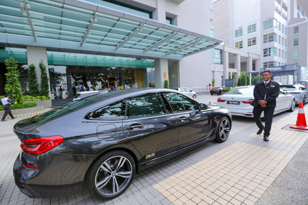PENANG, MALAYSIA - JULY 05, 2019 : Luxury BMW car operate by Hertz. Hertz is an American car rental company with international locations in 145 countries worldwide.のeditorial素材