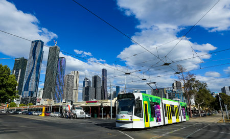 MELBOURNE, AUSTRALIA - MARCH 19, 2018 : The famous Melbourne Tram with the background of city center. Melbourne has the largest urban tramway network in the world. One of tourist attraction.のeditorial素材