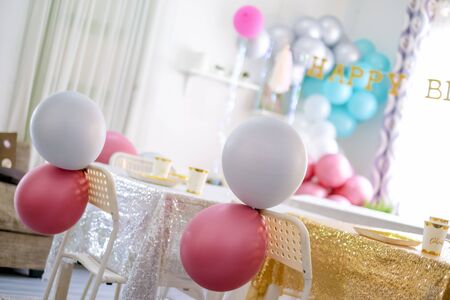 Birthday party decoration with table setup and balloon.の写真素材