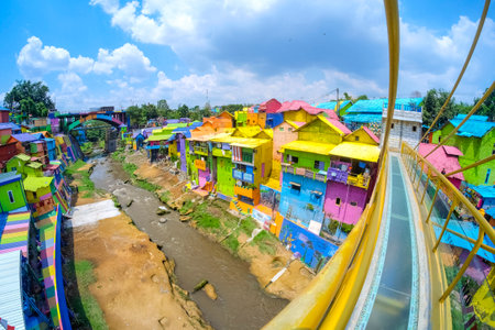 MALANG, INDONESIA - NOVEMBER 29, 2019 : The colorful houses of Kampung Warna Warni in Jodipan. Popular place to visit for city tour on holidays. Travel destination in East Java.のeditorial素材