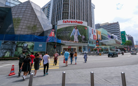 KUALA LUMPUR, MALAYSIA - FEBRUARY 22, 2020 : A crowd of people at Pavilion, Bukit Bintang or Star Hill, a tourist attraction place for shopping, eat and sightseeing.のeditorial素材