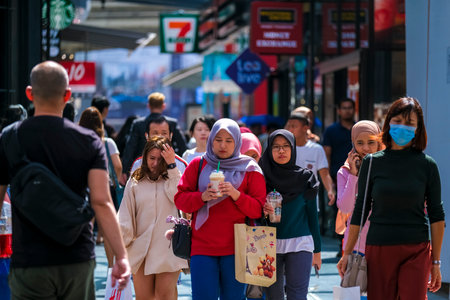 KUALA LUMPUR, MALAYSIA - FEBRUARY 22, 2020 : A crowd of people at Bukit Bintang or Star Hill, a...