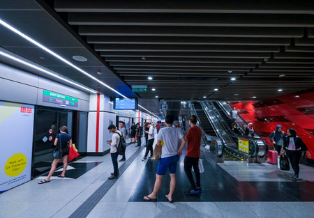 KUALA LUMPUR, MALAYSIA - FEBRUARY 22, 2020 : Passenger waiting for Mass Rapid Transit (MRT) train at...