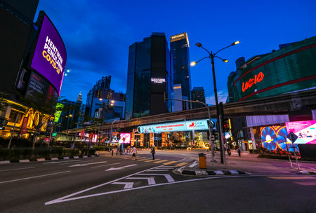 KUALA LUMPUR, MALAYSIA - MARCH 25, 2020: A night view of almost empty Bukit Bintang area as the government imposed a Movement Control Order (MCO) nationwide to combat the COVID-19 outbreak.のeditorial素材