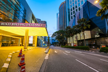 KUALA LUMPUR, MALAYSIA - MARCH 25, 2020: A night view of almost empty Bukit Bintang area as the government imposed a Movement Control Order (MCO) nationwide to combat the COVID-19 outbreak.のeditorial素材