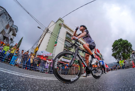 PAHANG, MALAYSIA - FEBRUARY 27, 2016: Riders compete during Le Tour de Langkawi (LTDL) 2016. LTDL is a multiple-stage bicycle race held in Malaysia.のeditorial素材