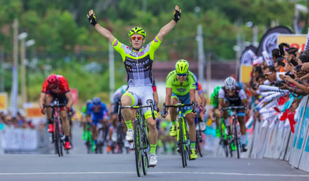 NEGERI SEMBILAN, MALAYSIA - FEBRUARY 25, 2016: Riders compete during Le Tour de Langkawi (LTDL) 2016. LTDL is a multiple-stage bicycle race held in Malaysia.のeditorial素材
