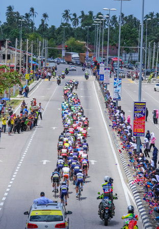 JOHOR, MALAYSIA - MARCH 02, 2016: Riders compete during Le Tour de Langkawi (LTDL) 2016. LTDL is a multiple-stage bicycle race held in Malaysia.のeditorial素材
