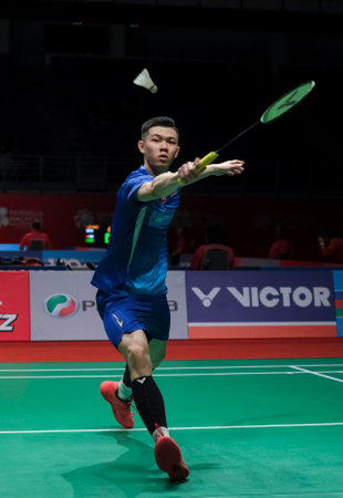 KUALA LUMPUR, MALAYSIA - JANUARY 09, 2020 : Lee Zii Jia of Malaysia in action during men's singles badminton tournament, Perodua Malaysia Masters 2020 at the Axiata Arena.のeditorial素材