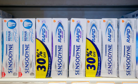 KUALA LUMPUR, MALAYSIA - MAY 30, 2021: Sensodyne toothpaste display in retail aisle. Sensodyne, is...