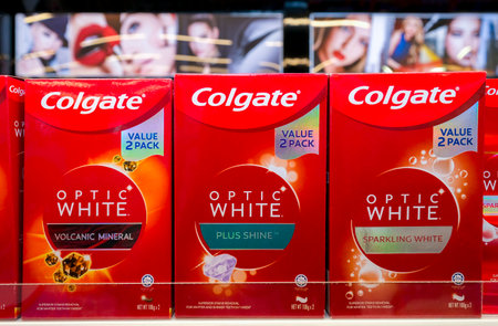 KUALA LUMPUR, MALAYSIA - MAY 30, 2021: Colgate Optic White Toothpaste display in retail aisle....