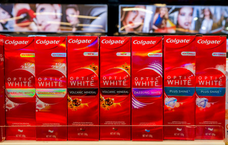 KUALA LUMPUR, MALAYSIA - MAY 30, 2021: Colgate Optic White Toothpaste display in retail aisle....