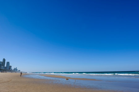 GOLD COAST, AUSTRALIA - APRIL 16, 2018: Beautiful weather and wonderful beaches at Surfers Paradise. One of the main tourist destination at Gold Coast.のeditorial素材