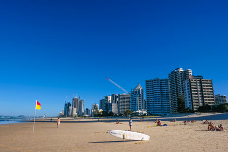 GOLD COAST, AUSTRALIA - APRIL 16, 2018: Local and foreign tourists are enjoying the glories weather and wonderful beaches at Surfers Paradise. One of the main tourist destination at Gold Coast.のeditorial素材