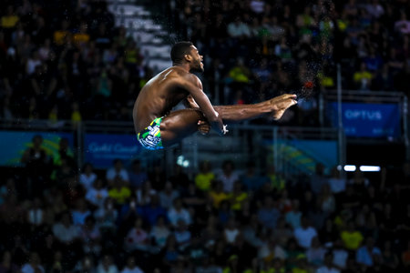 GOLD COAST, AUSTRALIA - APRIL 14, 2018: Yona Knight-Wisdom of Jamaica competes in the Men's 3m Springboard Diving Final of the Gold Coast 2018 Commonwealth Games.のeditorial素材