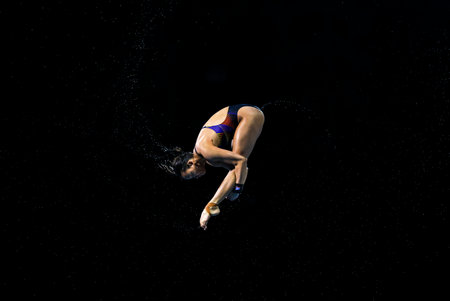 GOLD COAST, AUSTRALIA - APRIL 12, 2018: Pandelela Rinong Pamg of Malaysia competes in the Women's 10m Platform Diving Final of the Gold Coast 2018 Commonwealth Games at Gold Coast Aquatic Centre.のeditorial素材