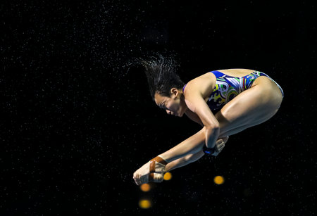 GOLD COAST, AUSTRALIA - APRIL 12, 2018: Jun Hoong Cheong of Malaysia competes in the Women's 10m Platform Diving Final of the Gold Coast 2018 Commonwealth Games at Gold Coast Aquatic Centre.のeditorial素材