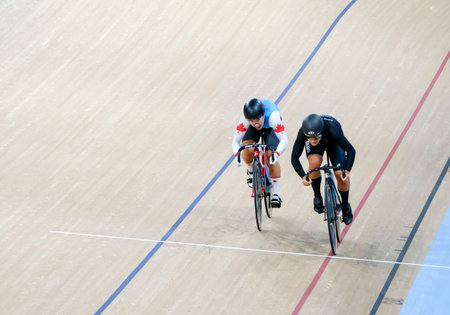 BRISBANE, AUSTRALIA - APRIL 07, 2018: Lauriane Genest of Canada and Natasha Hansen of New Zealand competes in the Women's Sprint during track cycling Gold Coast 2018 Commonwealth Games.のeditorial素材