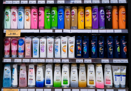 KUALA LUMPUR, MALAYSIA - FEBRUARY 05, 2022: Various brands of shampoo products on the shelf in a store supermarket. Hair care product.のeditorial素材