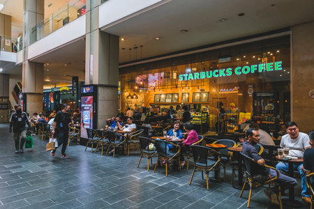 KUALA LUMPUR, MALAYSIA - MAY 27, 2022: Starbucks store in Kuala Lumpur. Starbucks Corporation is an...