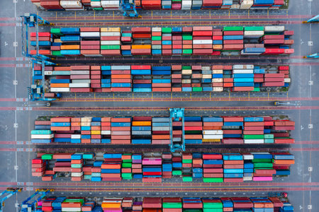 KLANG, MALAYSIA - OCTOBER 27, 2023:  International import-export containers cargo ship at Westports, Port Klang. Westports serves as the main gateway for container and conventional cargo.のeditorial素材