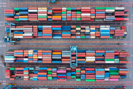 KLANG, MALAYSIA - OCTOBER 27, 2023:  International import-export containers cargo ship at Westports, Port Klang. Westports serves as the main gateway for container and conventional cargo.のeditorial素材