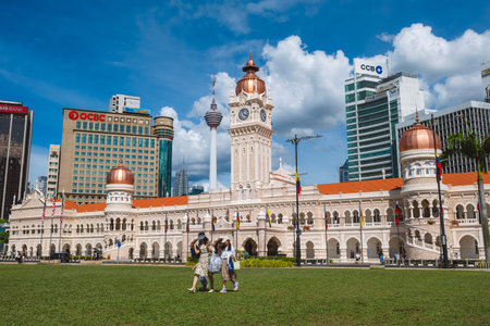 KUALA LUMPUR, MALAYSIA - FEBRUARY 10, 2026: People visiting the iconic Sultan Abdul Samad Building, one of Kuala Lumpurの写真素材