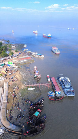 Aerial view of a busy harbor with various boats and ships near a crowded waterfront area