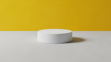 A single white cylinder sits on a yellow and white background isolated on a transparent backgroundの素材