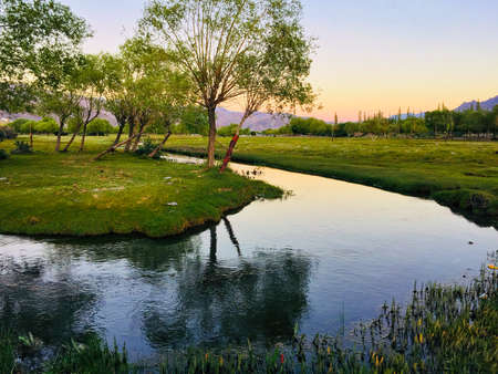This is a shot of a beautiful scenic sunset from my camp near Indus river at Leh, India.のeditorial素材