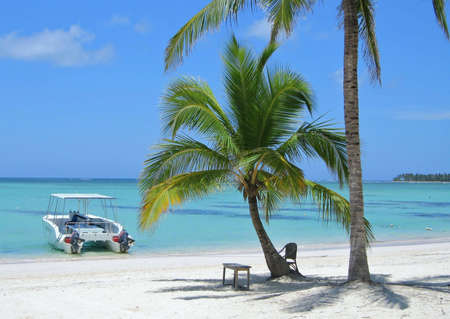 Beautiful Caribbean Beach with boat の写真素材