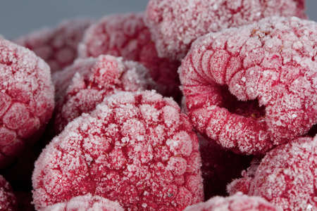 Frozen rasberries / Gefrorene Himbeerenの写真素材