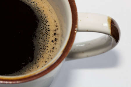 Black Coffee creme in white cup very strongの写真素材