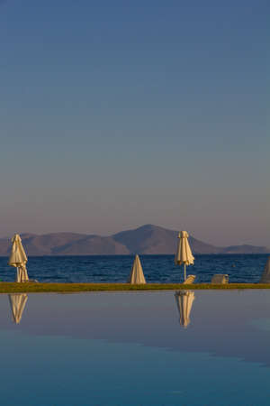 View at the pool with mountains in the backgroundの写真素材