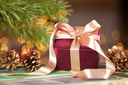 Christmas present piled underneath a christmas tree.